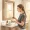 Woman at a bathroom counter with only two products, calm and deliberate