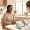 Woman in a clinical consultation discussing treatment options