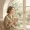 Woman sitting calm by the window